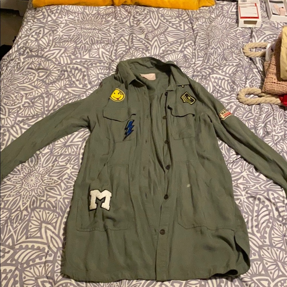 Can be worn as dress or as long blazer